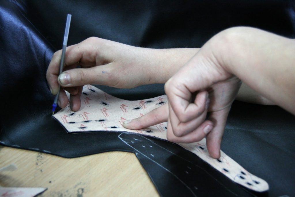 A design pattern is being cut for bespoke tailoring