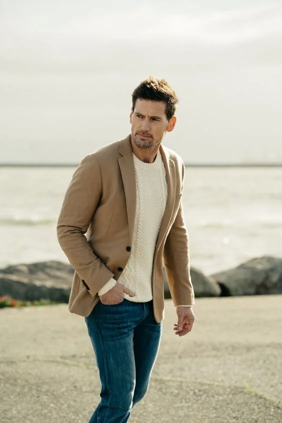 mens outfit with khaki blazer and blue jeans