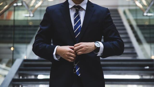 a navy blue semi formal suit for men