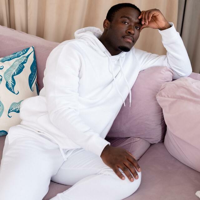 man wearing an all white California style outfit