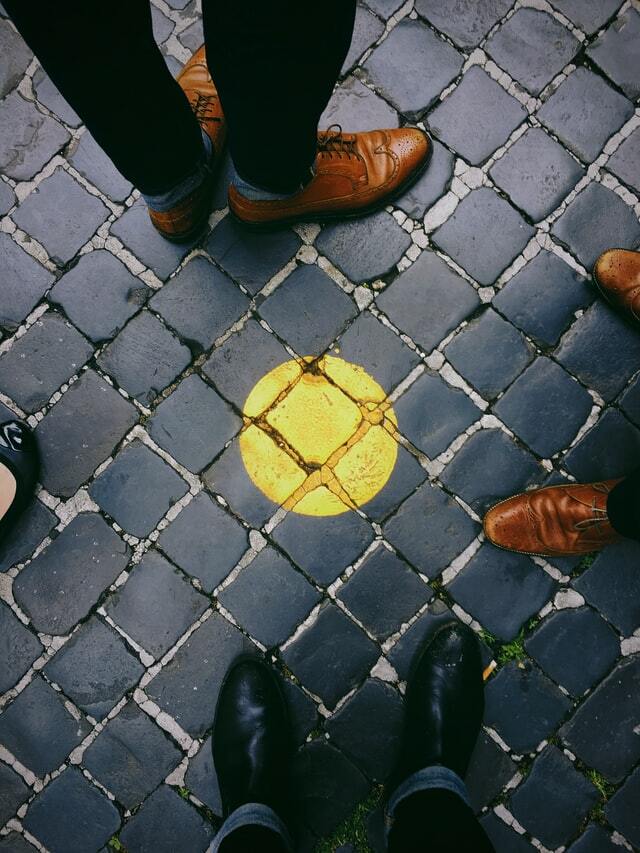 brown brogue shoes with black pants