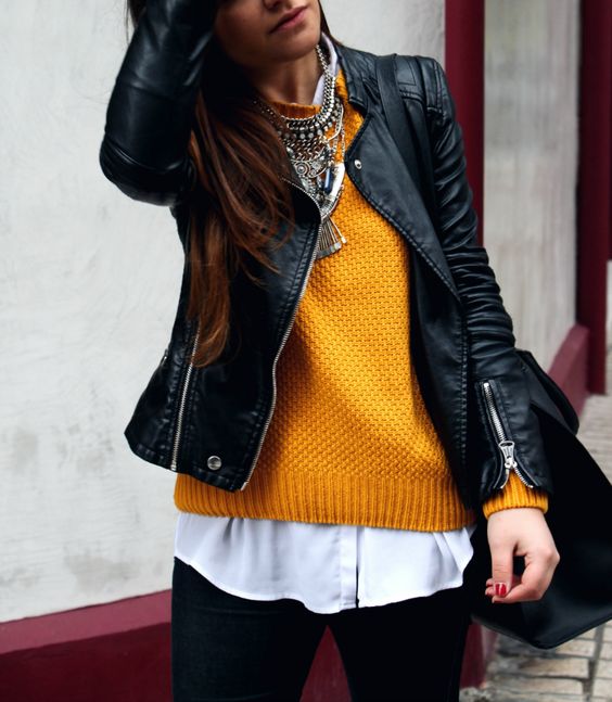 leather jacket with mustard sweater