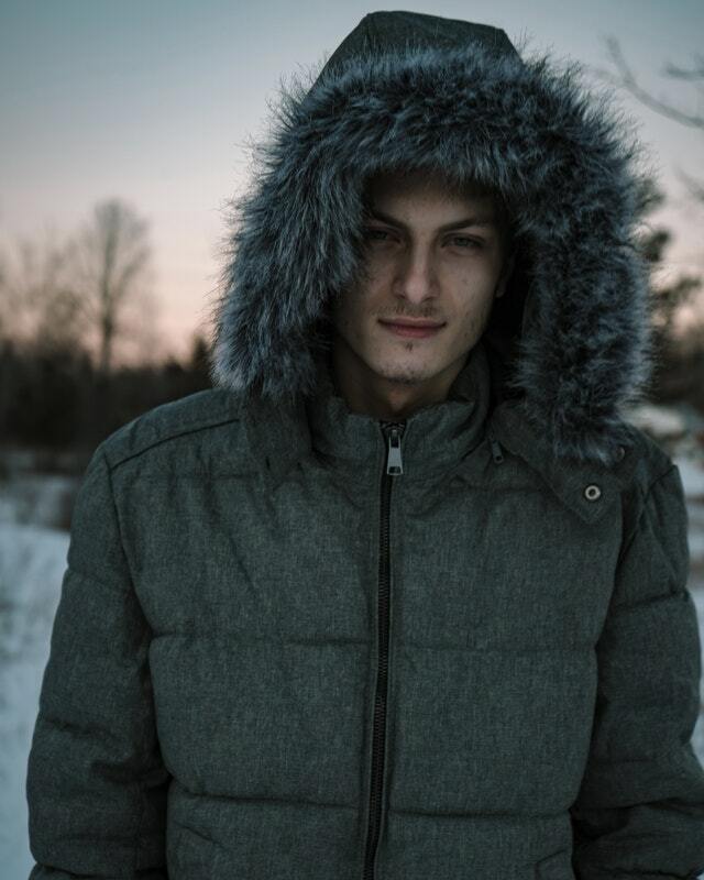 man wearing fur hooded jacket