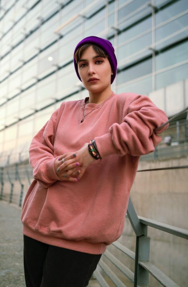 girl wearing a beanie and sweatshirt