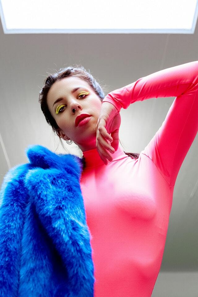 blue fur jacket with pink turtleneck