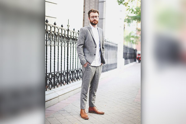 Person in Brown Pants and Black Leather Shoes  Free Stock Photo