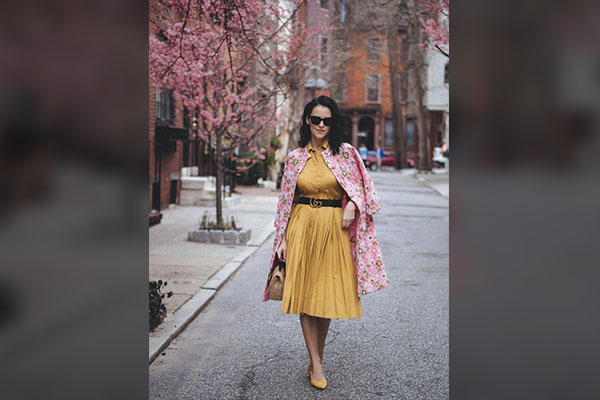 An Oversized Baby Pink Coat and A Pale Yellow Skirt 