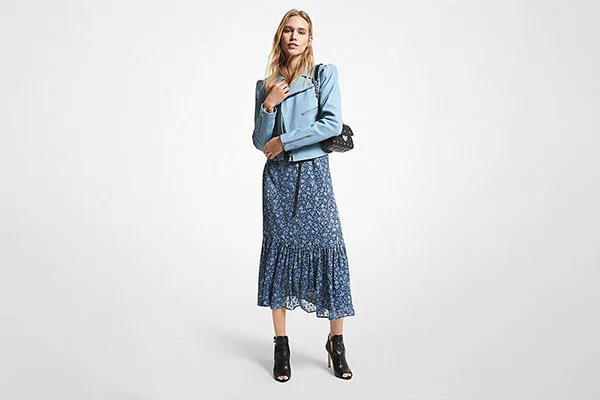 4. Blue Asymmetric Biker Jacket Over a Skirt