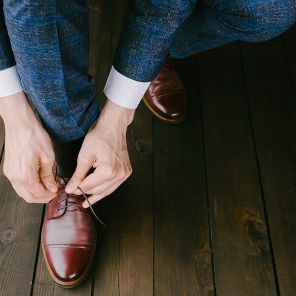 blue suit with brown shoes