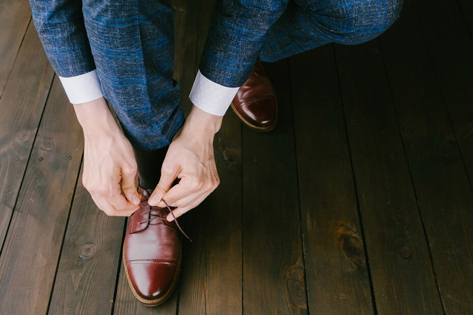 blue suit with brown shoes