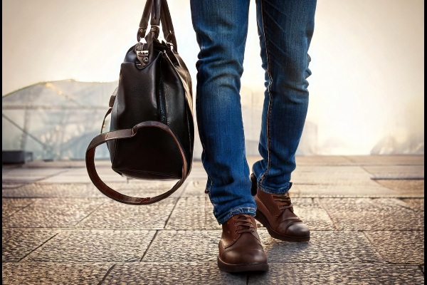 mixing black and brown boots through accessories