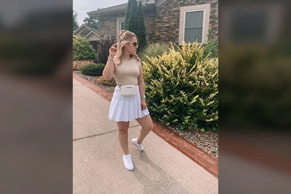 White Tennis Skirt with a Tank Top and Denim Jacket